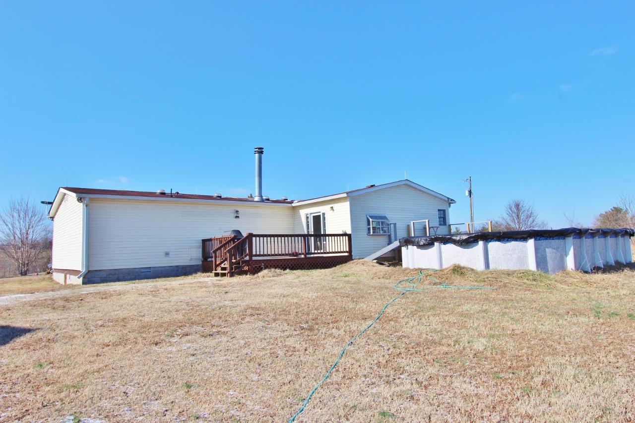 6830 Beasleys Bend Road Lebanon, TN 37087 - Photo 24 of 30 a view of a house with a yard and garage