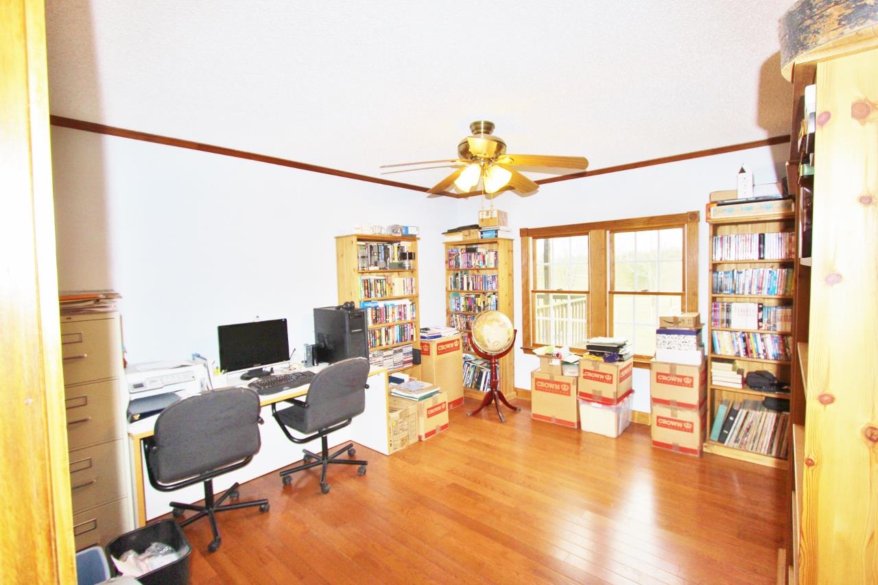 6830 Beasleys Bend Road Lebanon, TN 37087 - Photo 9 of 30 a view of a workspace with furniture and a window