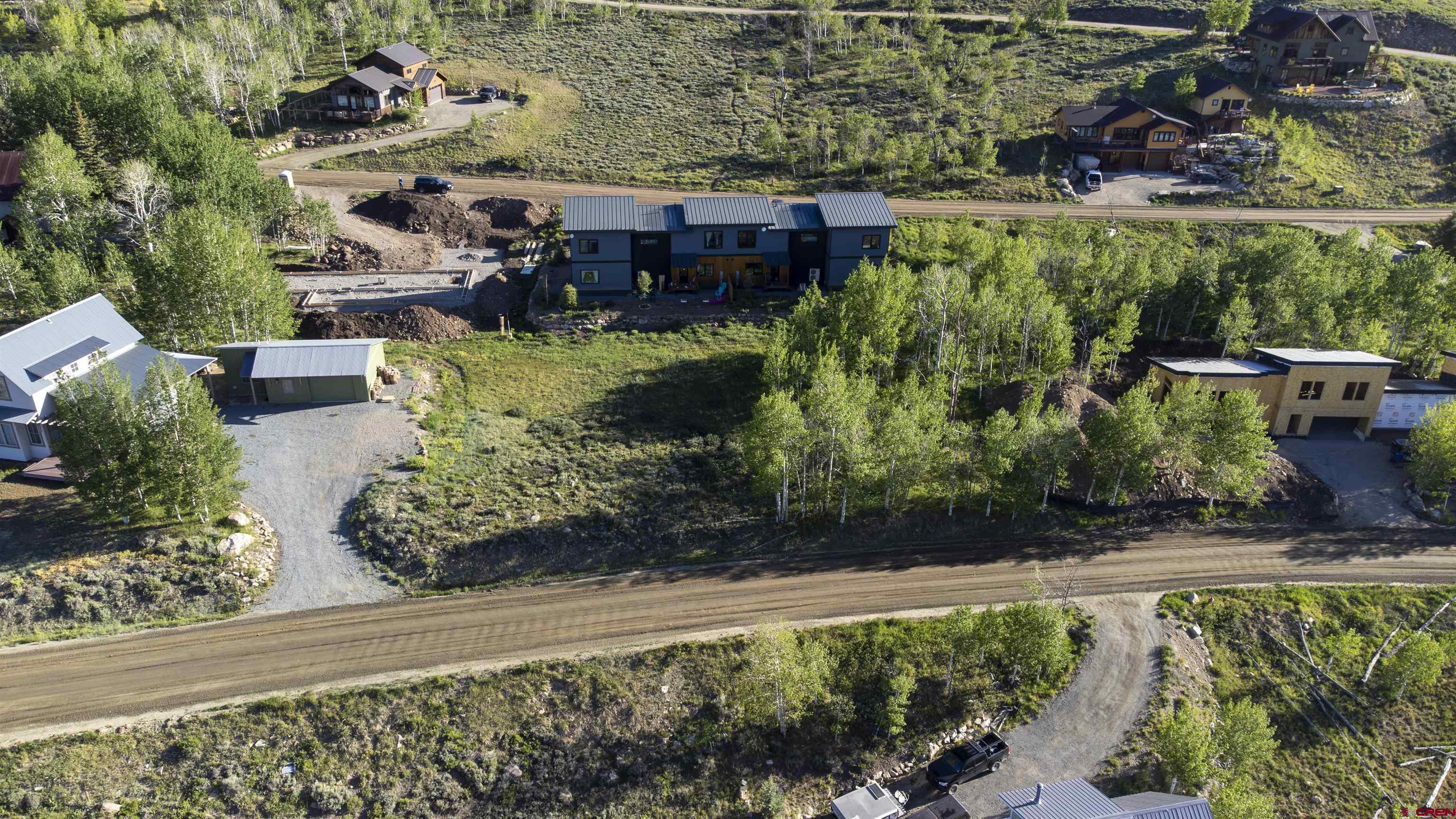 451 Zeligman Street Crested Butte, CO 81224 - Photo 6 of 10 an aerial view of a house with a yard basket ball court and outdoor seating