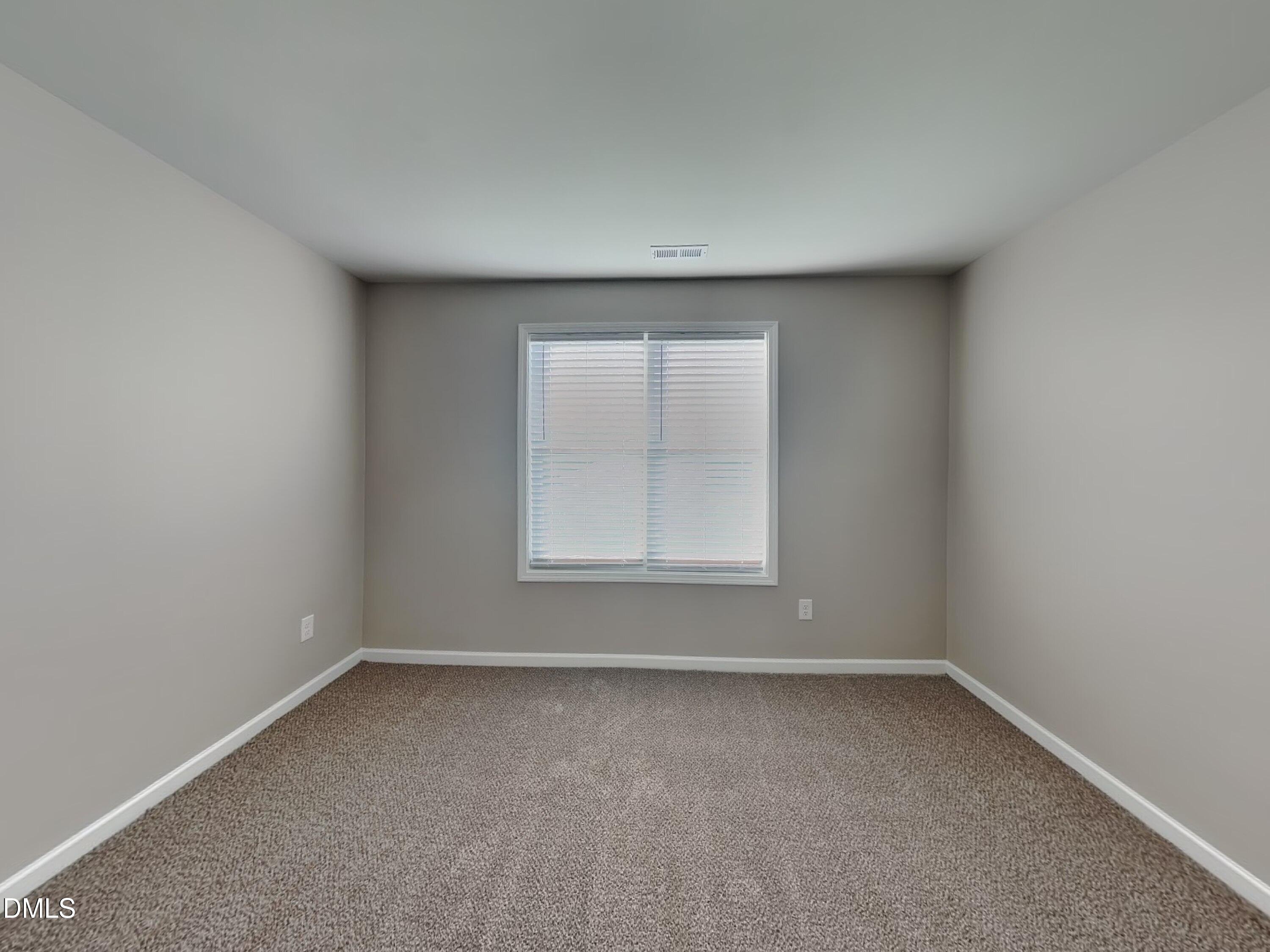 265 Frst Mdw Lane Franklinton, NC 27525 - Photo 16 of 17 an empty room with a window