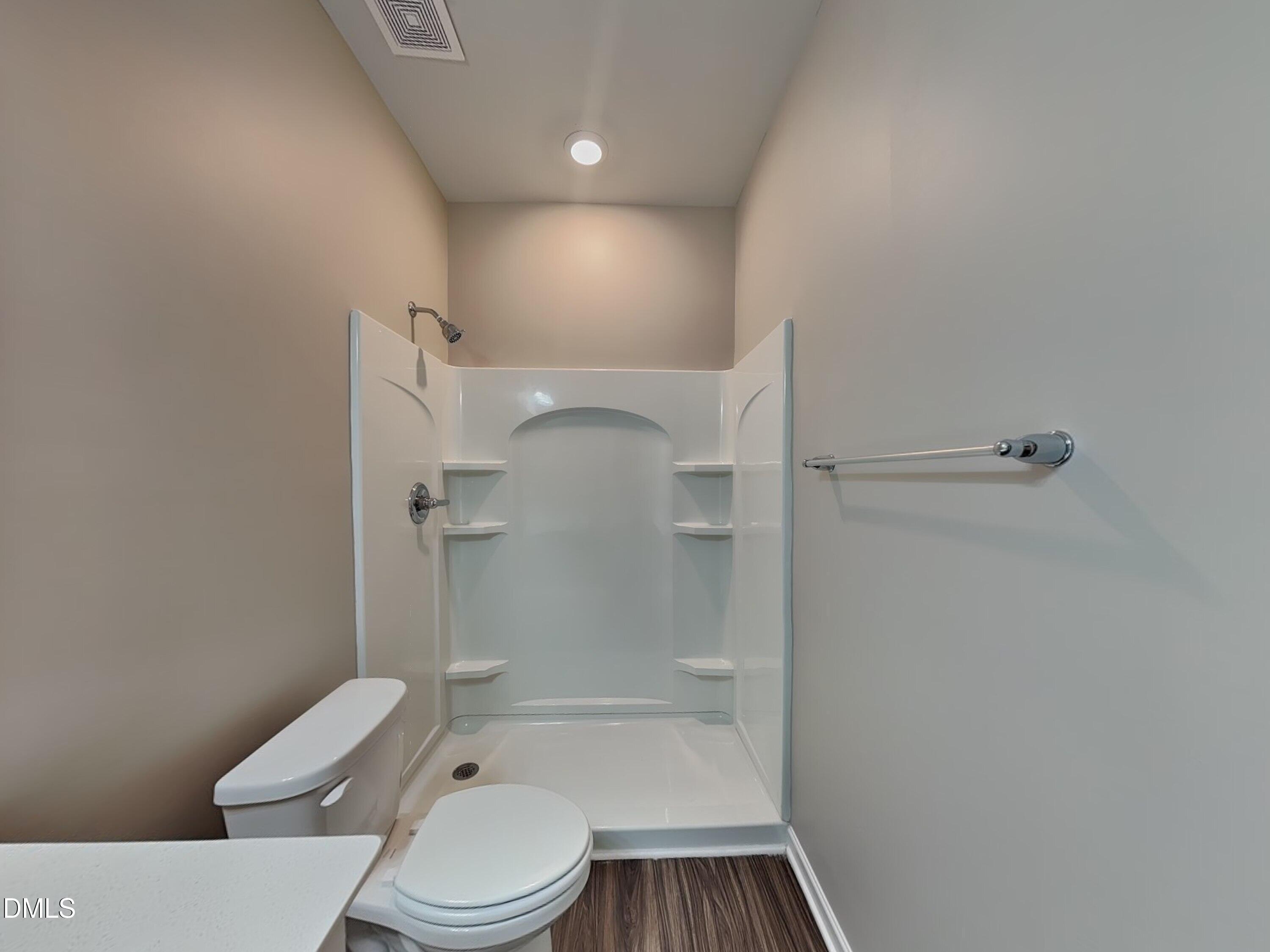 265 Frst Mdw Lane Franklinton, NC 27525 - Photo 10 of 17 a bathroom with a toilet and a shower