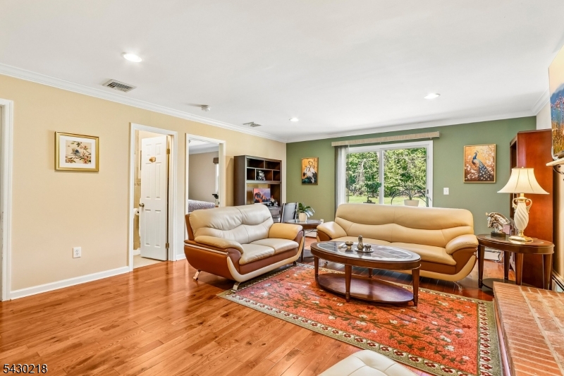 718 New Dover Road Edison, NJ 08820 - Photo 3 of 22 a living room with furniture and a window