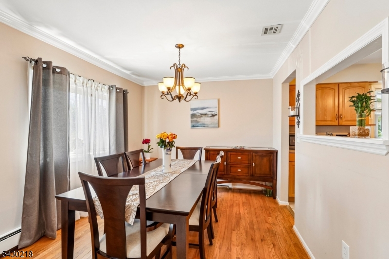 718 New Dover Road Edison, NJ 08820 - Photo 6 of 22 a dining room with furniture and window