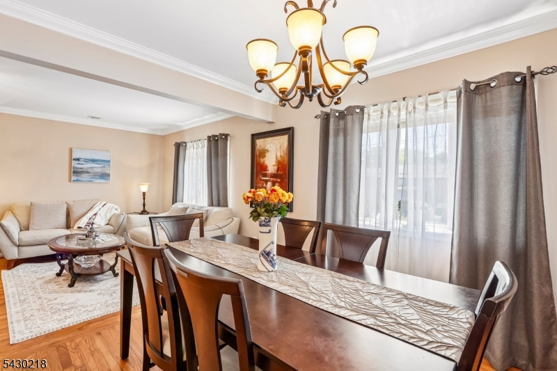718 New Dover Road Edison, NJ 08820 - Photo 8 of 22 a view of a dining room with furniture window and outside view