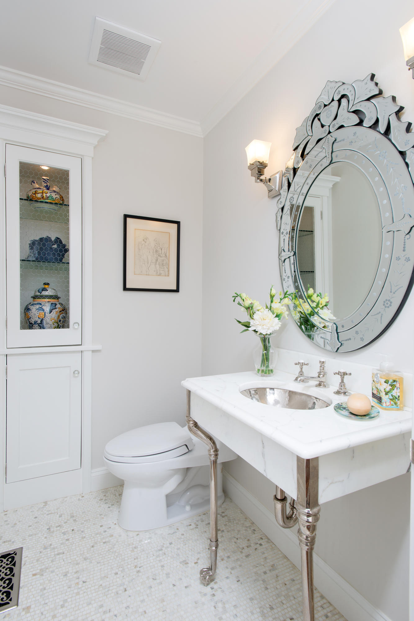 104 Logan Road New Canaan, CT 06840 - Photo 10 of 34 a bathroom with a sink a toilet and a mirror
