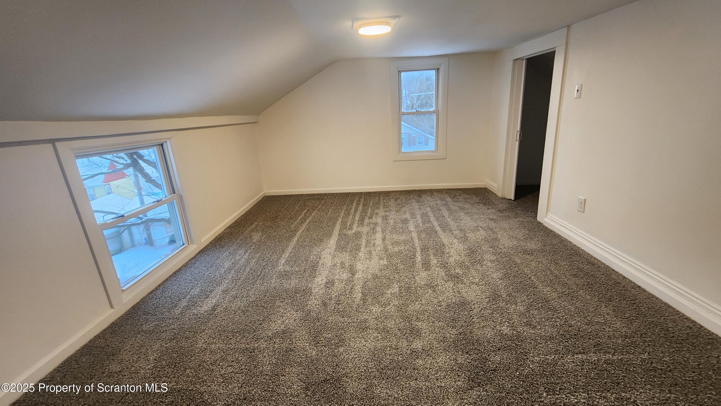 38 Prospect Street Hop Bottom, PA 18824 - Photo 16 of 41 an empty room with windows