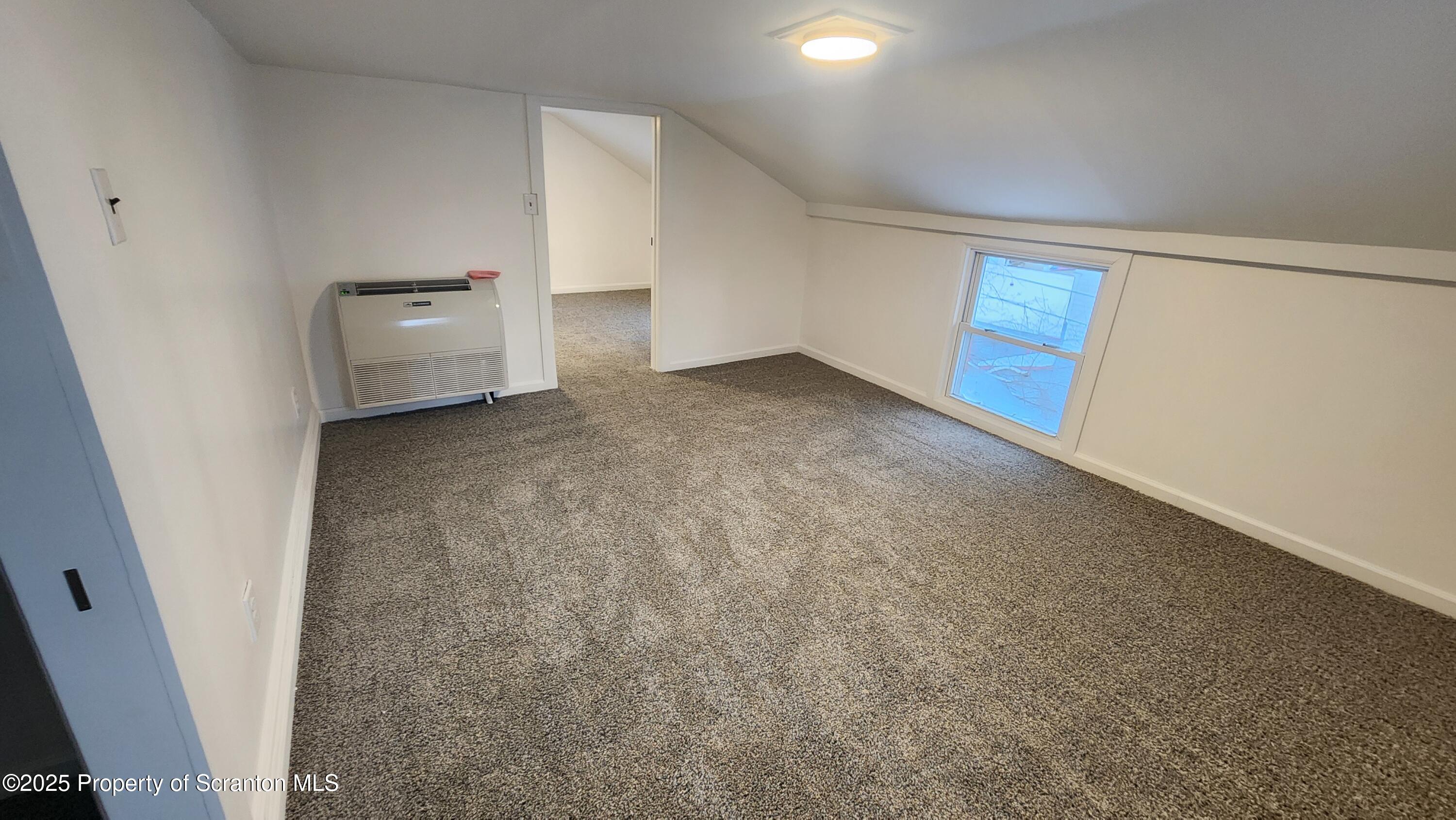 38 Prospect Street Hop Bottom, PA 18824 - Photo 17 of 41 an empty room with a door