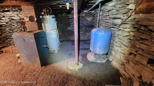 a view of a room with furniture and wooden floor