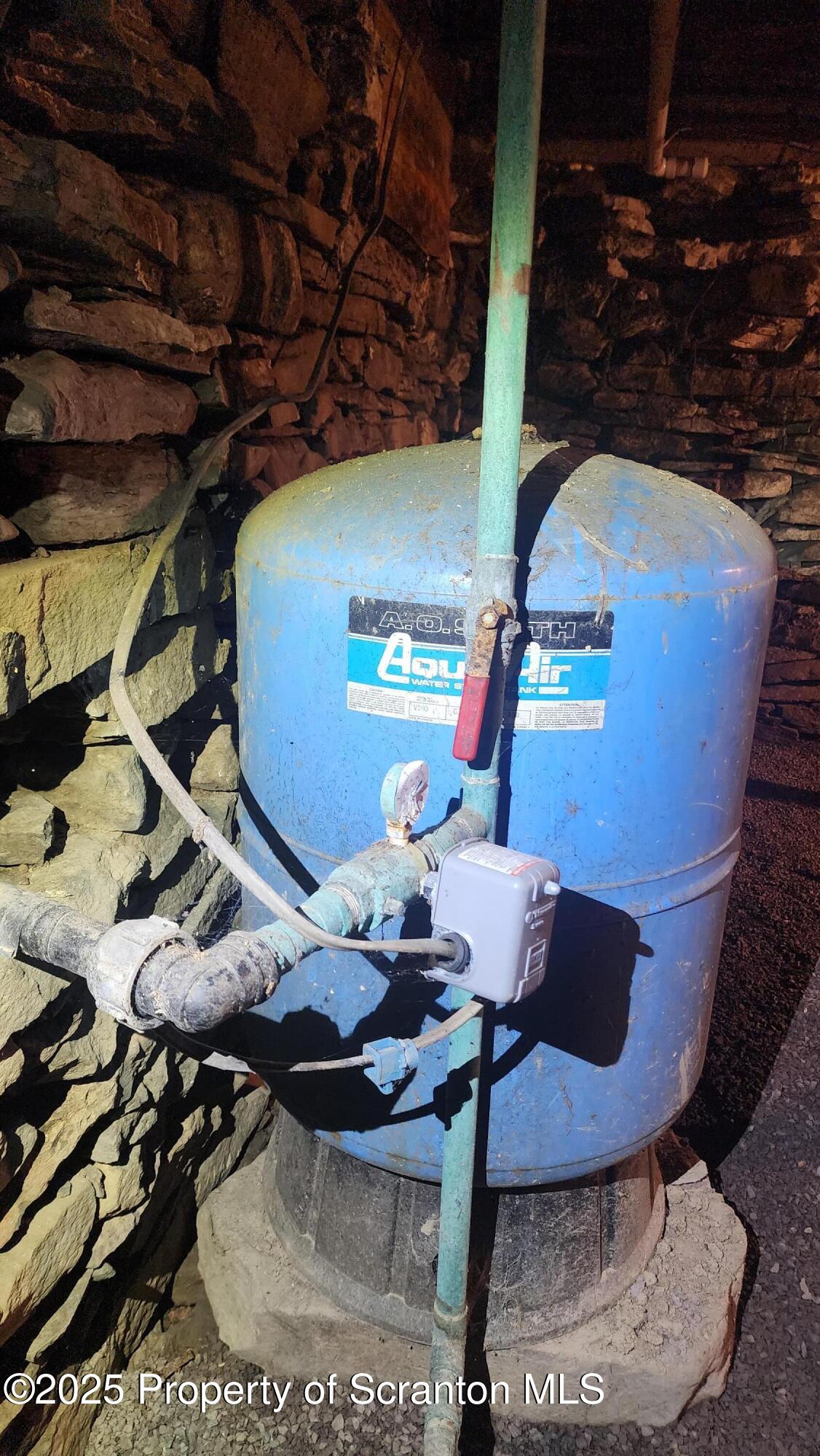 38 Prospect Street Hop Bottom, PA 18824 - Photo 29 of 41 a view of a room with furniture and wooden floor