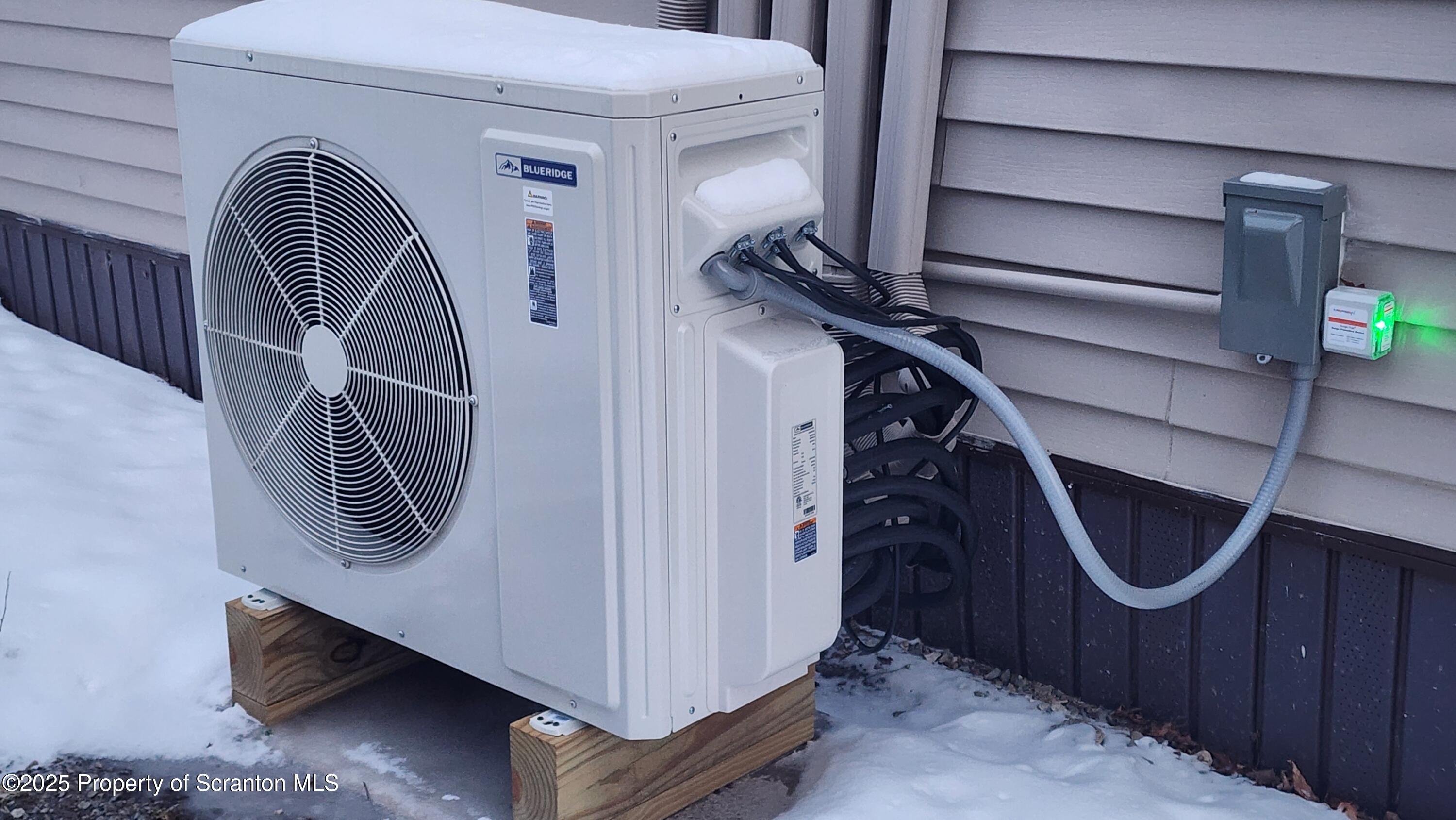 38 Prospect Street Hop Bottom, PA 18824 - Photo 32 of 41 a utility room with dryer and washer