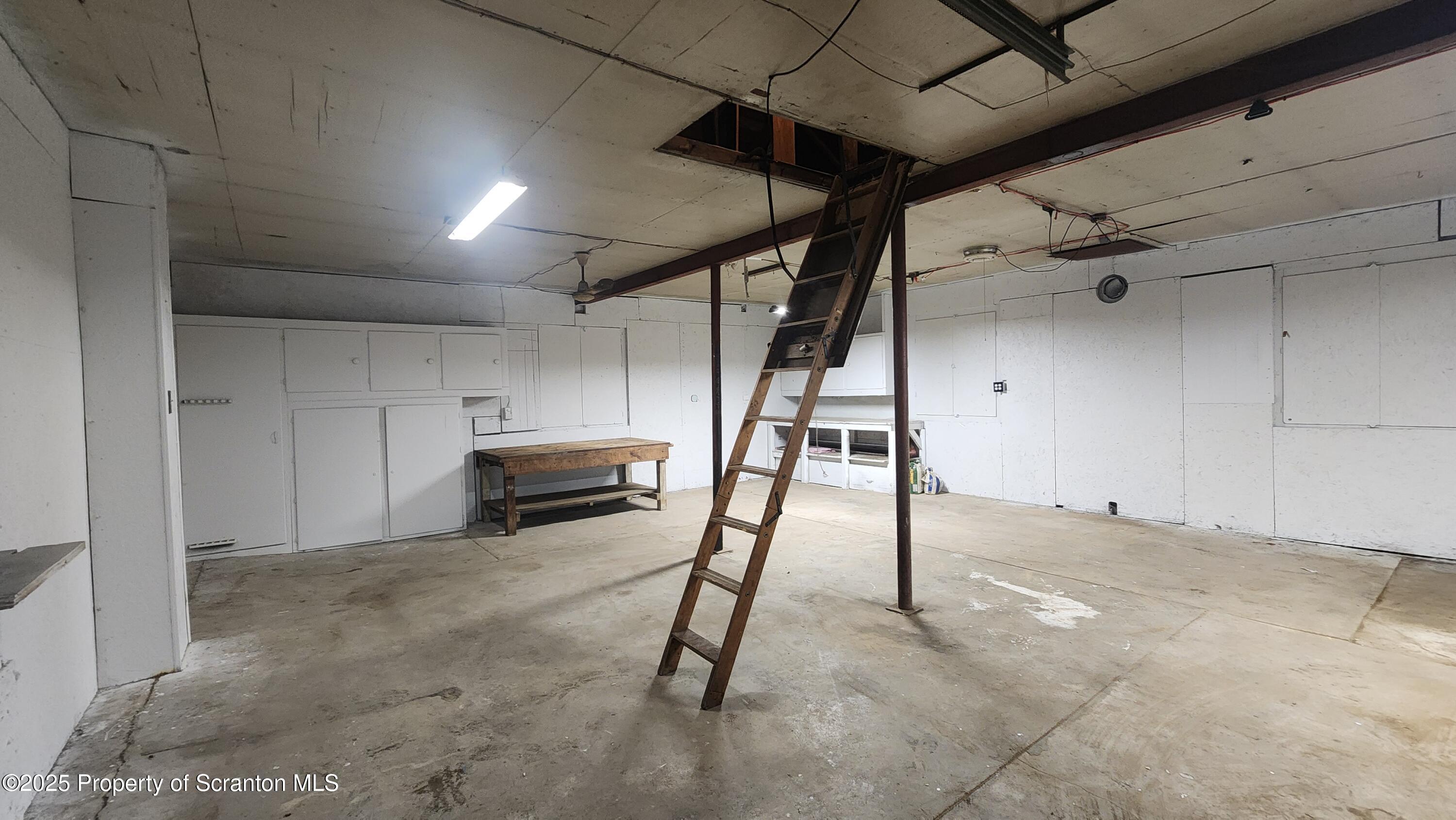 38 Prospect Street Hop Bottom, PA 18824 - Photo 37 of 41 a view of a garage room