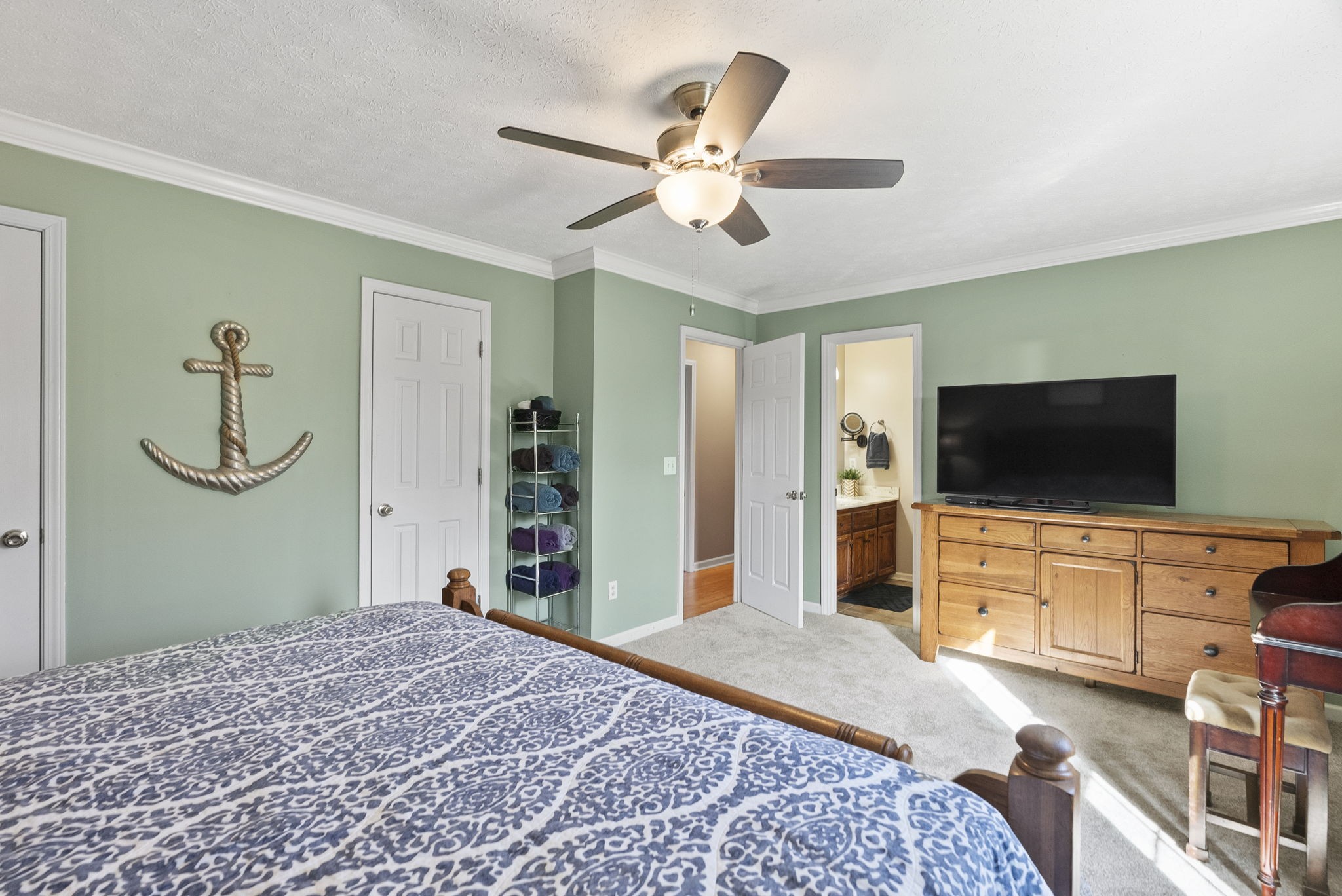 145 Kilgore Trace Cross Plains, TN 37049 - Photo 20 of 34 a bedroom with a bed and a flat screen tv
