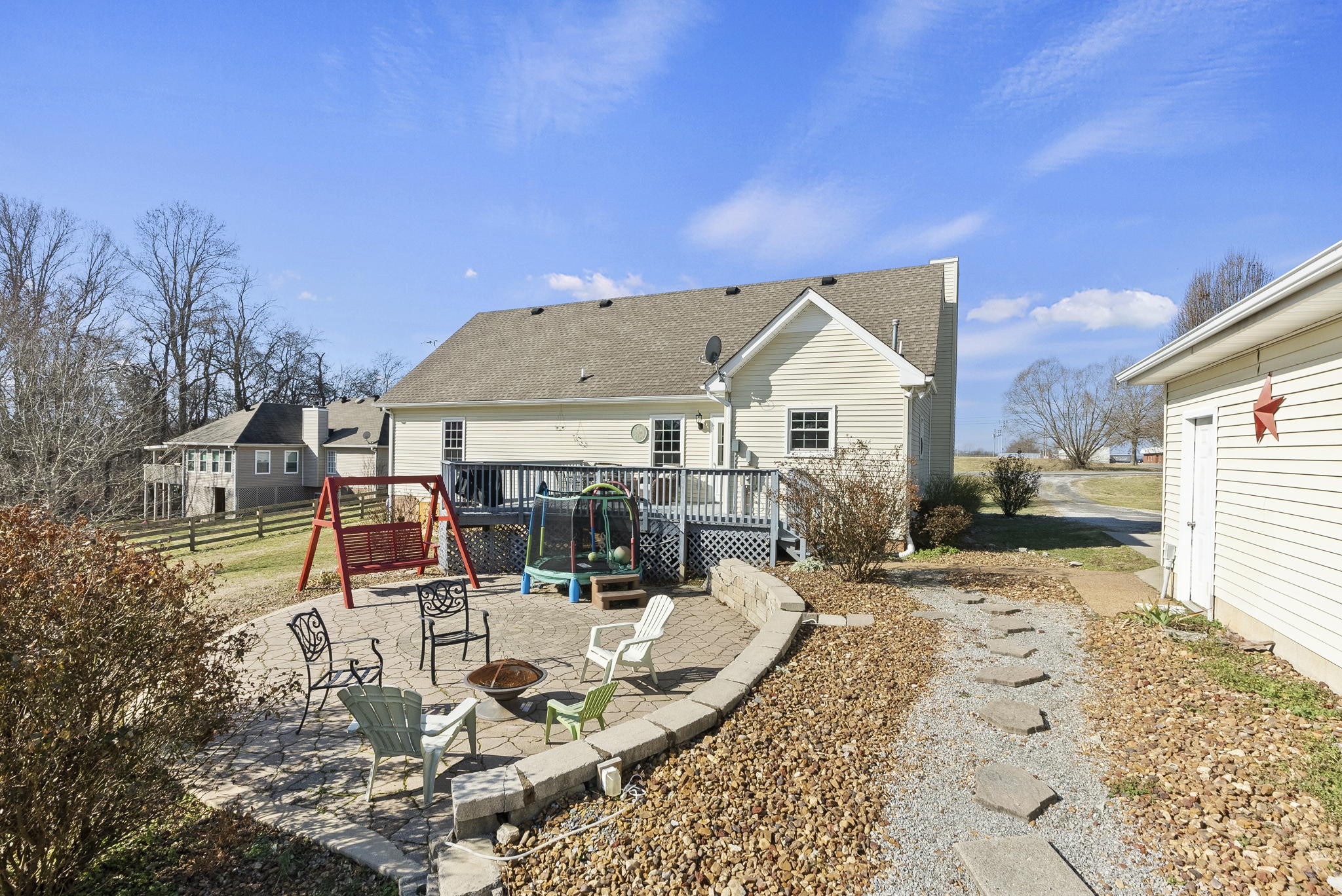 145 Kilgore Trace Cross Plains, TN 37049 - Photo 27 of 34 a view of a house with backyard outdoor seating and covered with snow