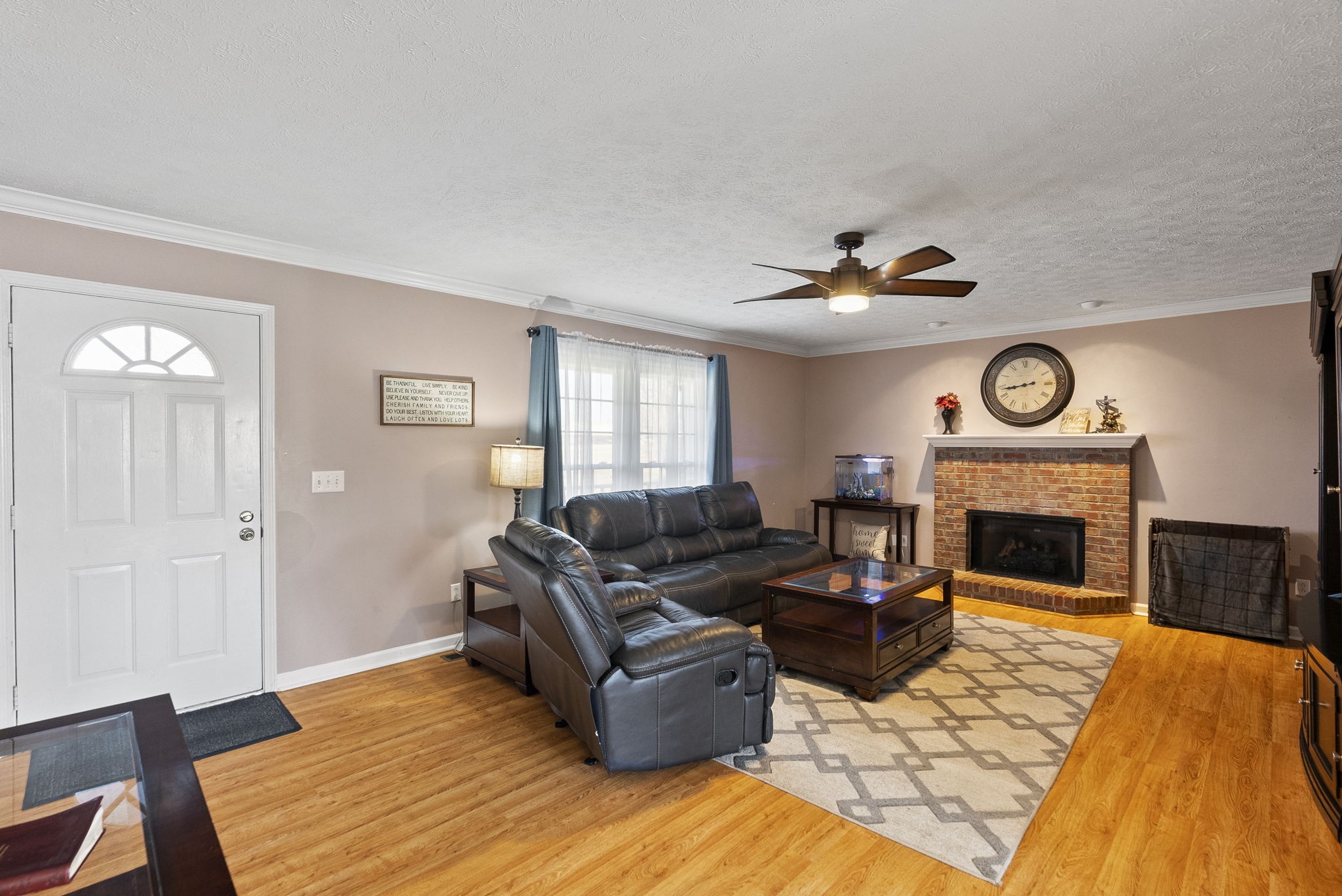 145 Kilgore Trace Cross Plains, TN 37049 - Photo 8 of 34 a living room with furniture and a fireplace