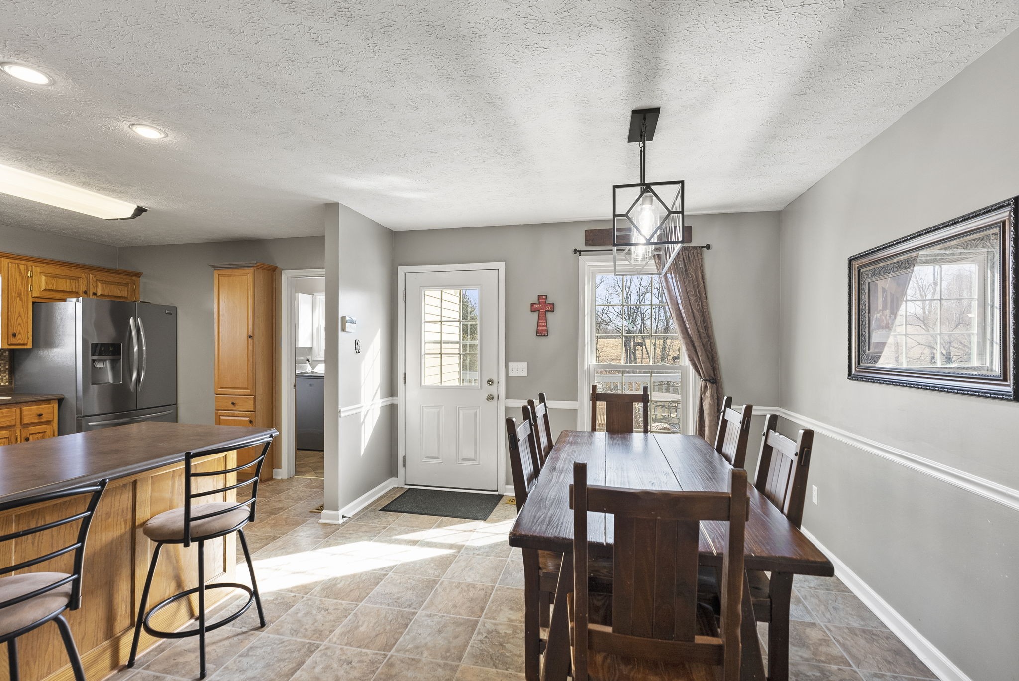 145 Kilgore Trace Cross Plains, TN 37049 - Photo 10 of 34 a view of a a dining room with furniture window and wooden floor