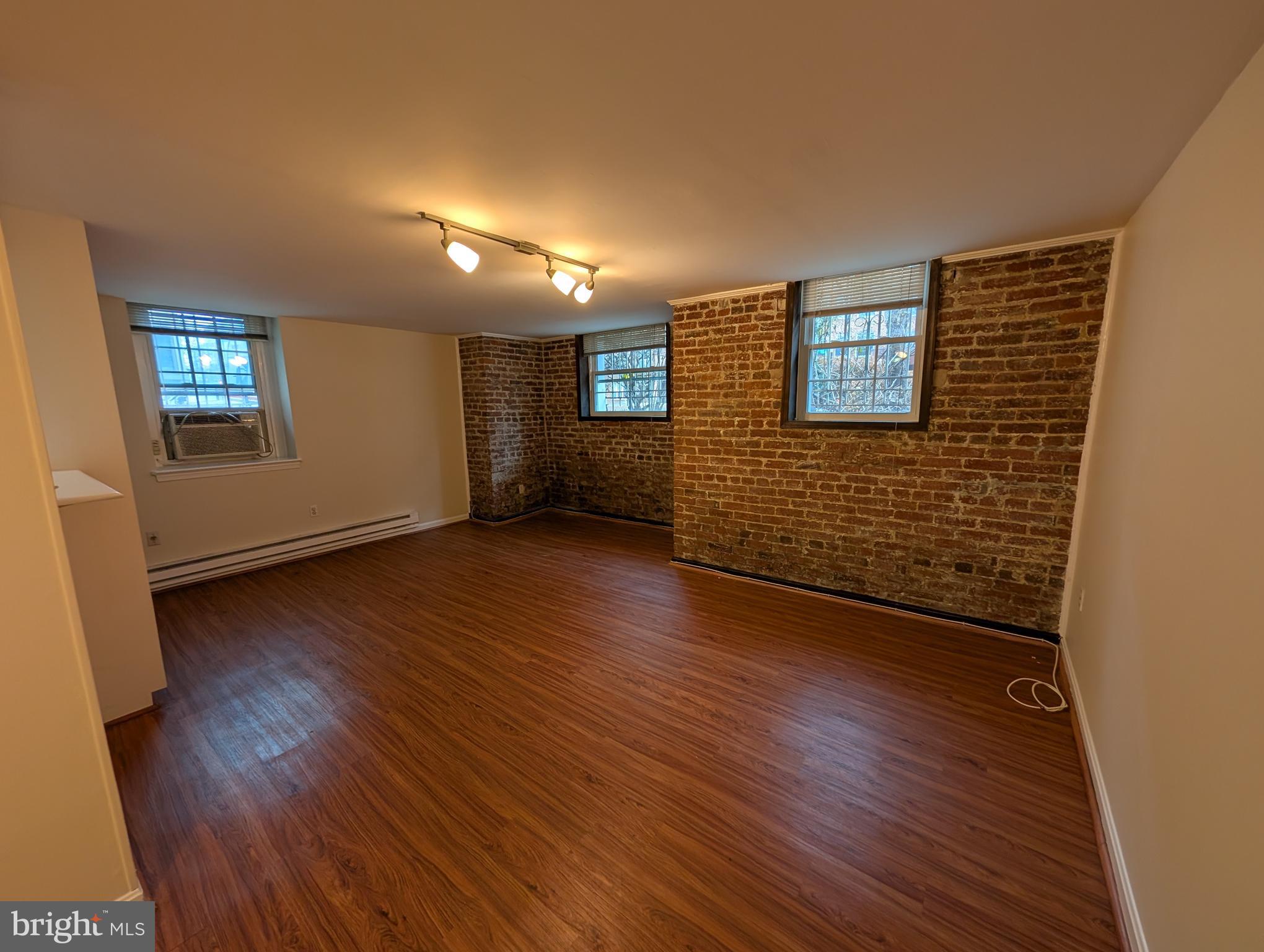 1332 15th Street Northwest, Unit B2 Washington, DC 20005 - Photo 3 of 42 Exposed brick walls