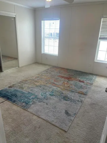 an empty room with windows