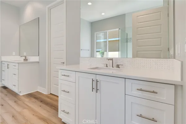 a sink with a mirror