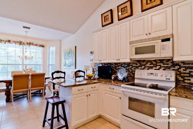 31275 River Road Orange Beach, AL 36561 - Photo 14 of 32 Heart of the Home Overlooks Backyard