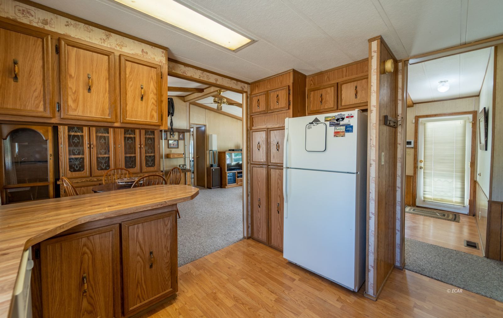 659 Spring Valley Lane Spring Creek, NV 89815 - Photo 5 of 25 a kitchen with stainless steel appliances granite countertop a refrigerator and a sink