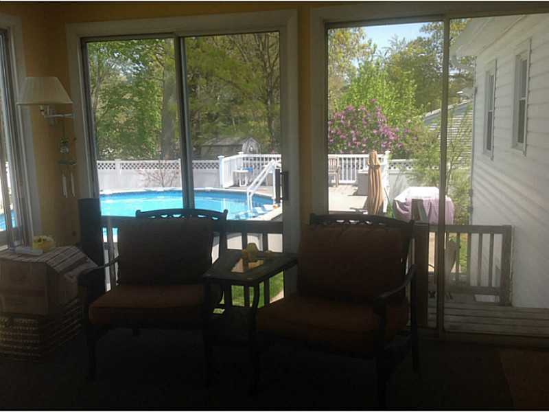 5 Cape Way Coventry, RI 02816 - Photo 9 of 14 Porch. Porch looking at the pool