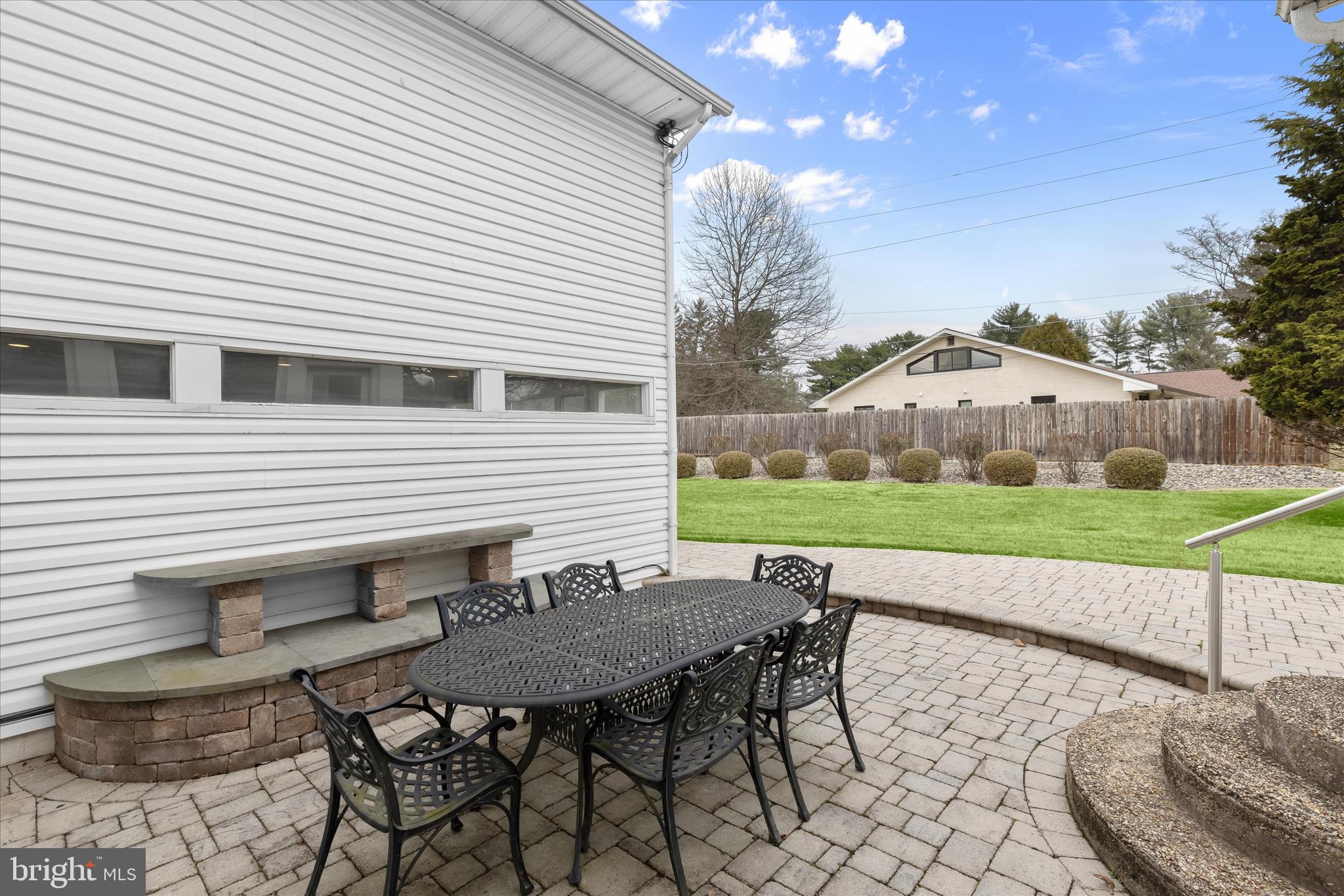 3408 Old Post Drive Baltimore, MD 21208 - Photo 71 of 81 a backyard of a house with table and chairs