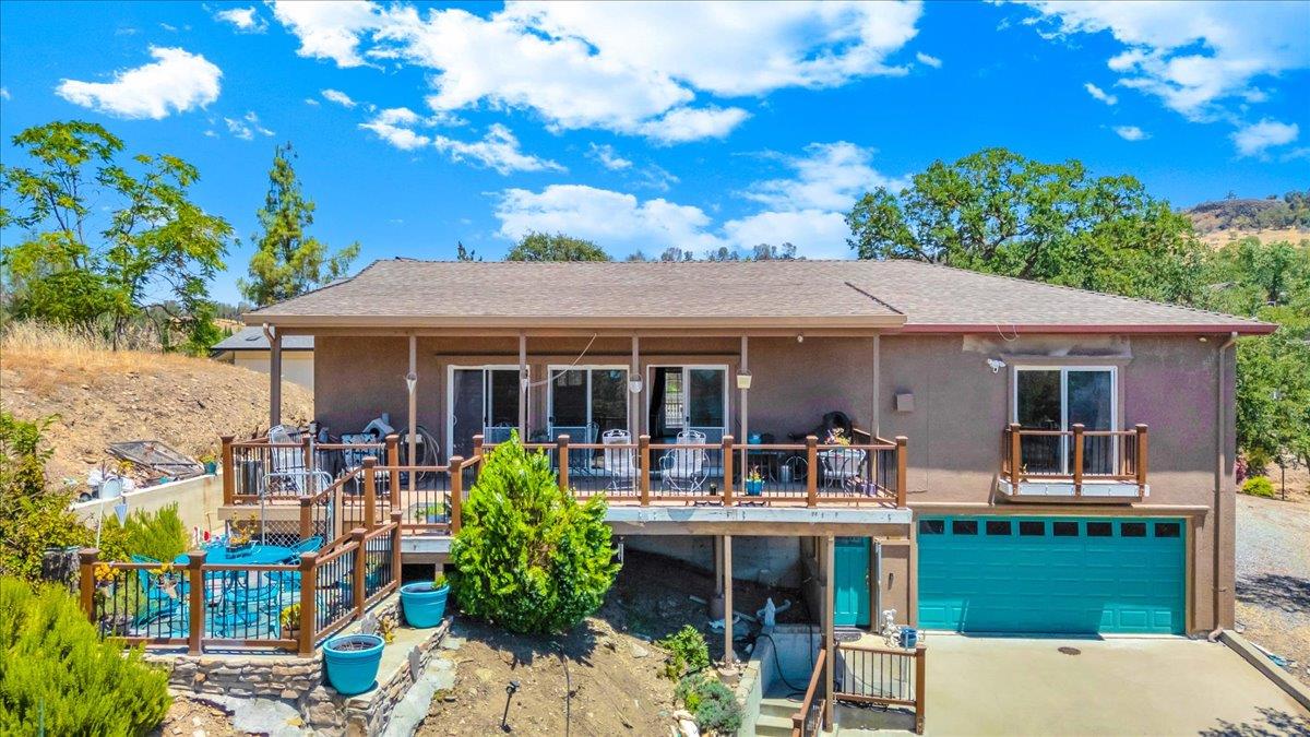 411 Sunrise Road Copperopolis, CA 95228 - Photo 4 of 76 Beachy turquoise accents and expansive deck areas to enjoy the view!
