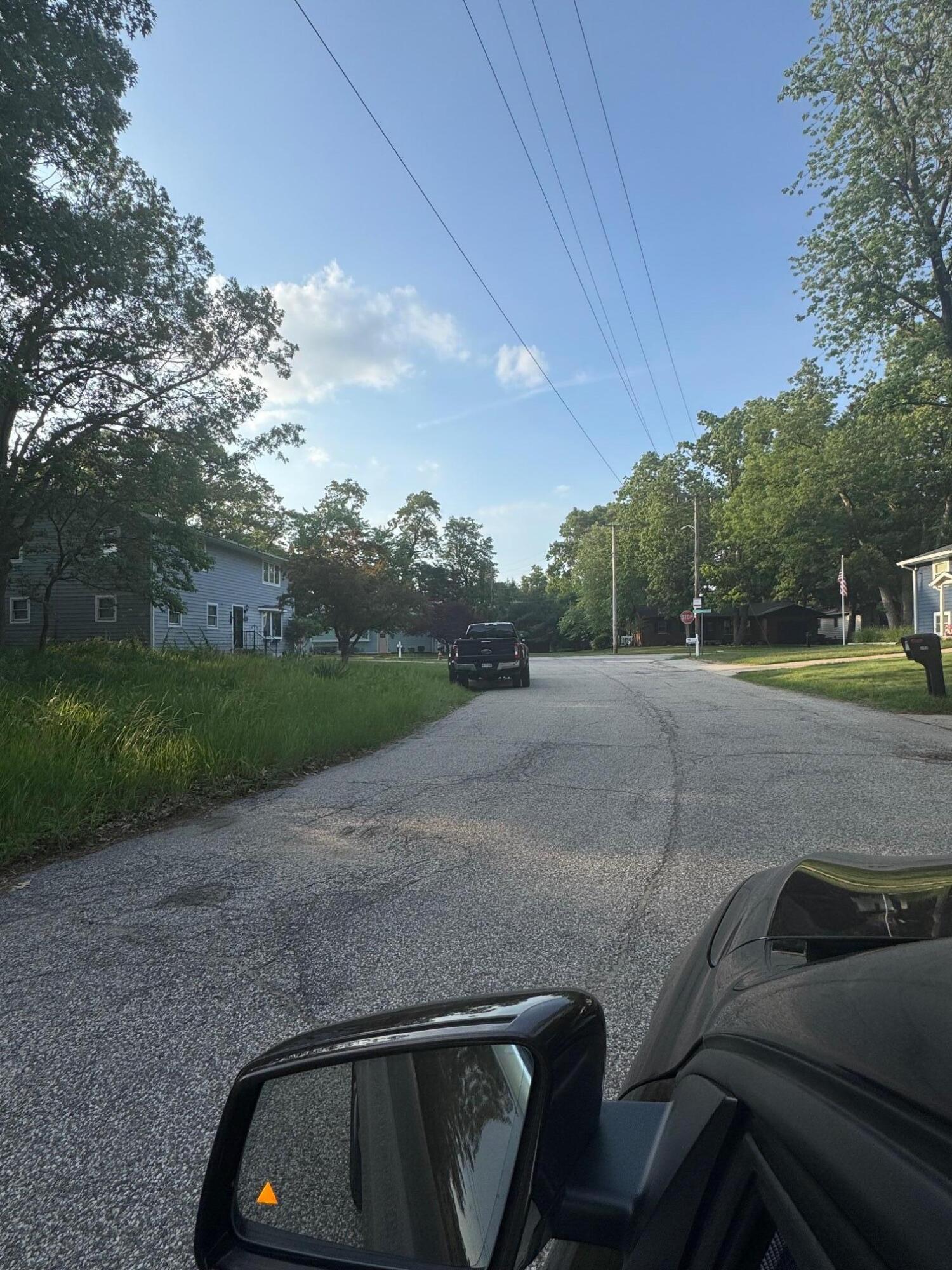 0 Carter Road Michigan City, IN 46360 - Photo 3 of 3 a view of a car parked on the side of the road