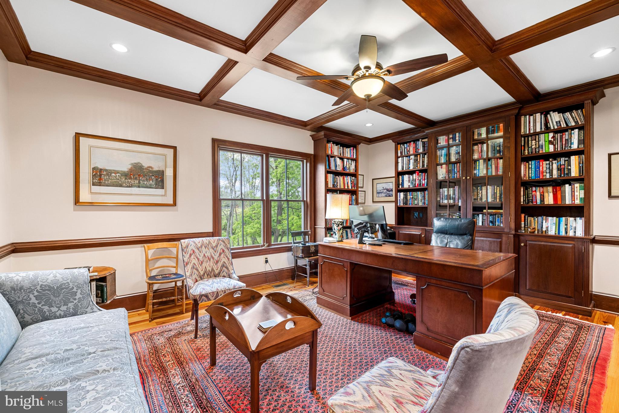 20147 Woodtrail Road Round Hill, VA 20141 - Photo 23 of 41 a living room with furniture a rug and a large window