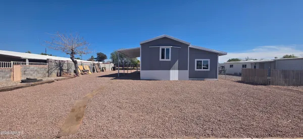 a view of a house with a patio
