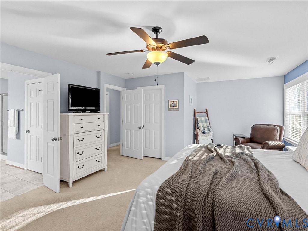 16101 Longlands Road Chesterfield, VA 23832 - Photo 18 of 48 a bedroom with a bed and a tv