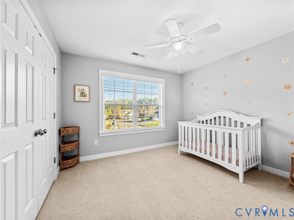 16101 Longlands Road Chesterfield, VA 23832 - Photo 26 of 48 a view of a bedroom with furniture and windows