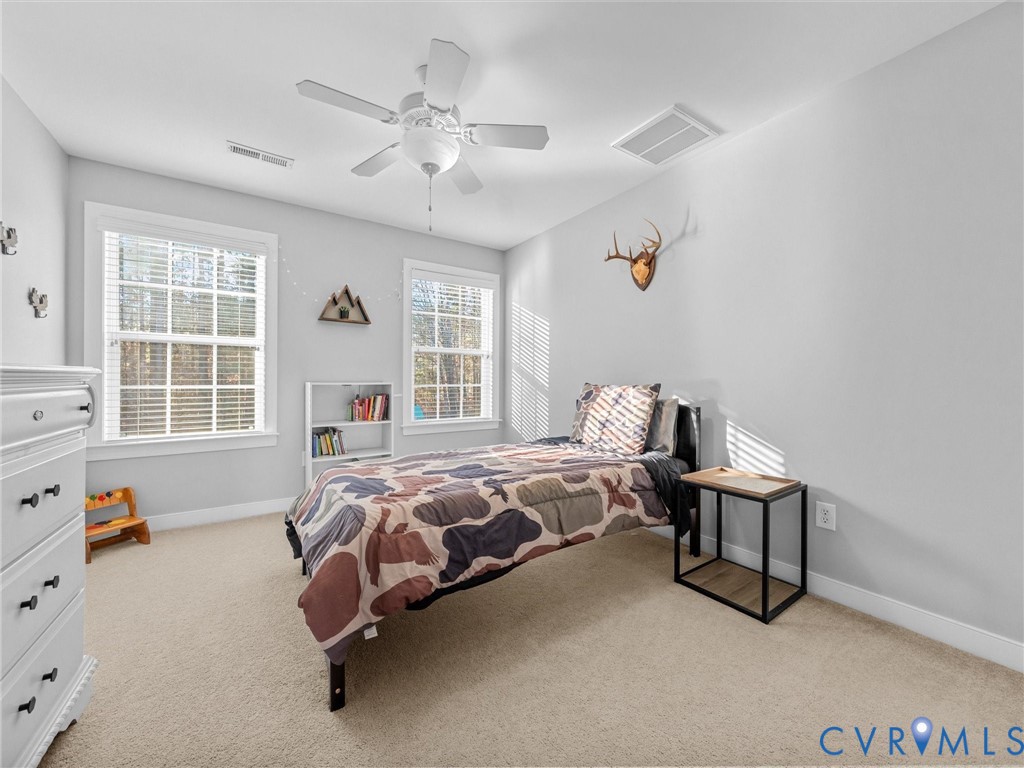 16101 Longlands Road Chesterfield, VA 23832 - Photo 28 of 48 a bedroom with a bed and a window