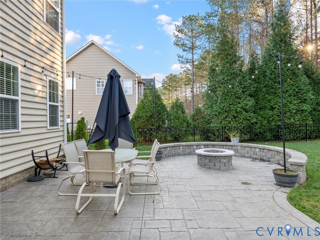 16101 Longlands Road Chesterfield, VA 23832 - Photo 34 of 48 a view of backyard with seating space and trees
