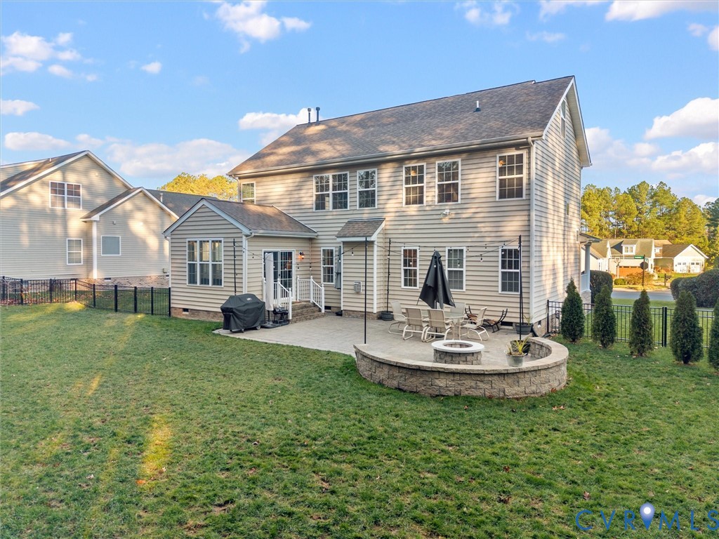 16101 Longlands Road Chesterfield, VA 23832 - Photo 38 of 48 a front view of a house with a garden and patio