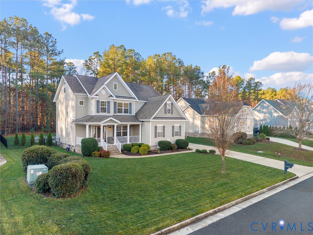 16101 Longlands Road Chesterfield, VA 23832 - Photo 40 of 48 a front view of a house with a garden