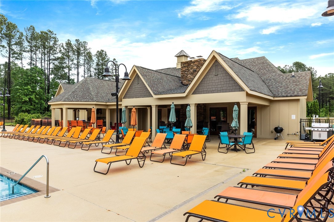 16101 Longlands Road Chesterfield, VA 23832 - Photo 48 of 48 a view of a house with swimming pool and sitting area