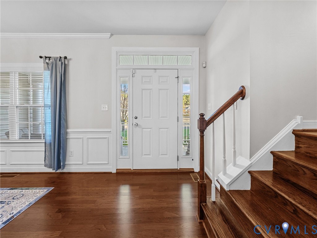 16101 Longlands Road Chesterfield, VA 23832 - Photo 6 of 48 a view of an entryway with wooden floor and staircase