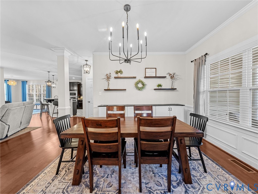 16101 Longlands Road Chesterfield, VA 23832 - Photo 7 of 48 a view of a dining room with furniture window and wooden floor