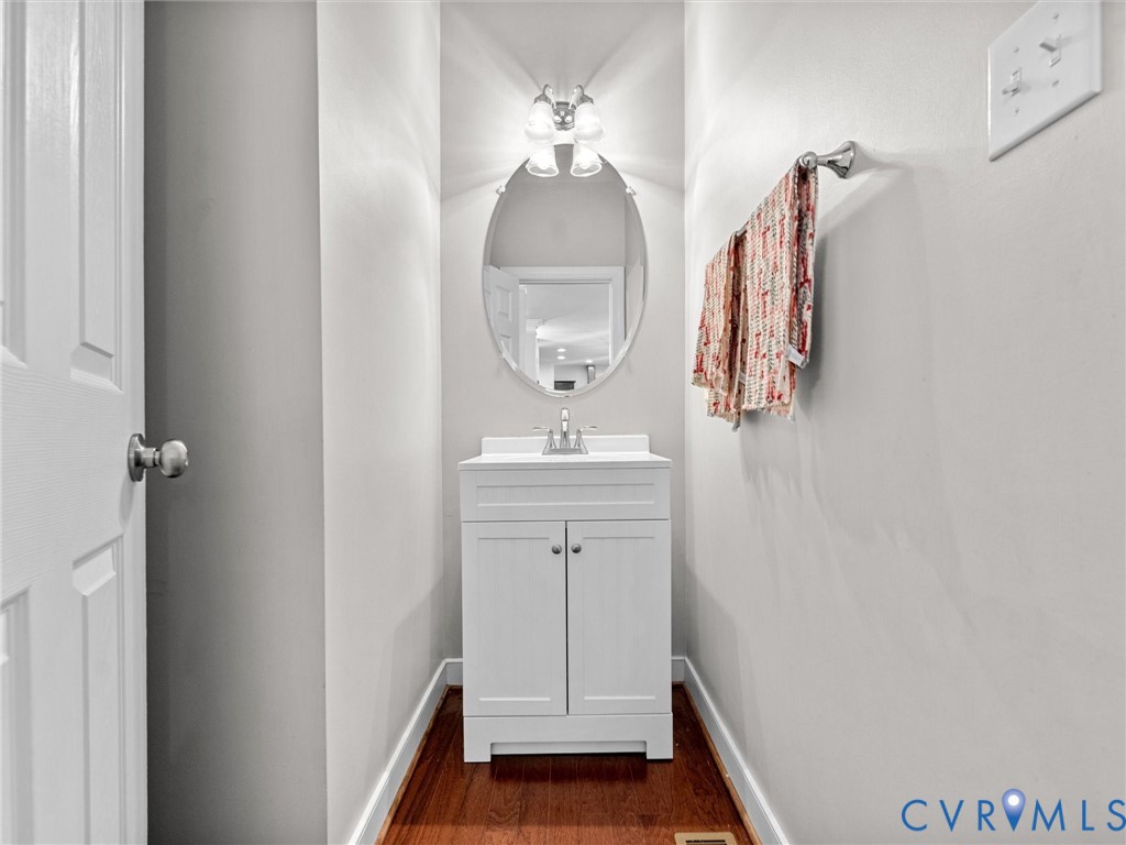 16101 Longlands Road Chesterfield, VA 23832 - Photo 8 of 48 a bathroom with a sink and a mirror