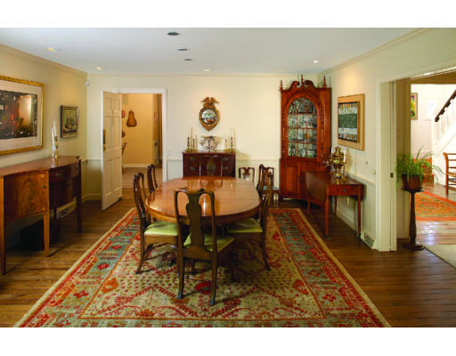 77 Yarmouth Road Brookline, MA 02467 - Photo 3 of 5 a view of a dining room with furniture and wooden floor