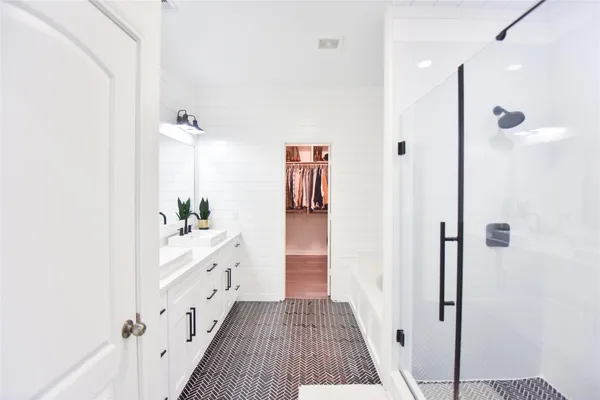a view of hallway with wooden floor