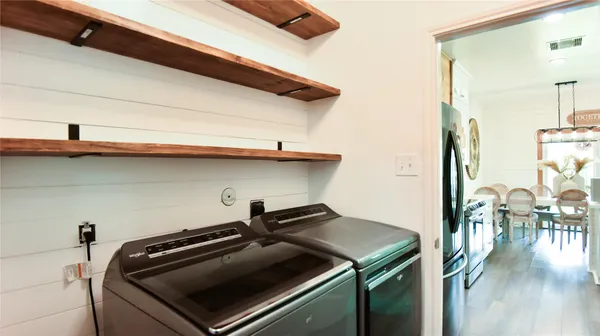 a view of swimming pool with a patio