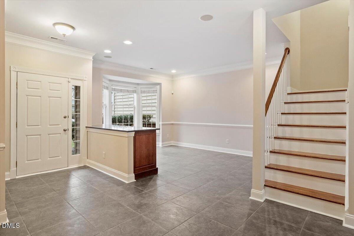 11213 Maplecroft Court Raleigh, NC 27617 - Photo 15 of 44 a view of an empty room with a window