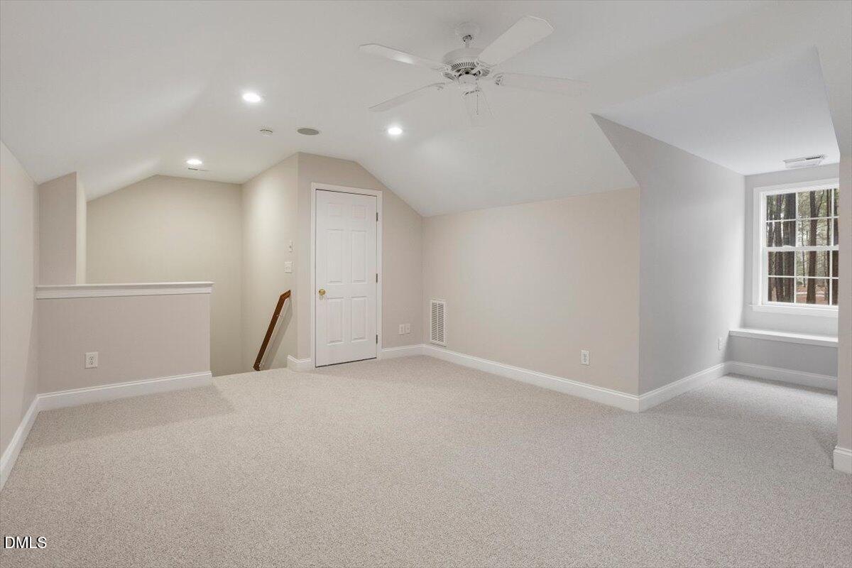 11213 Maplecroft Court Raleigh, NC 27617 - Photo 28 of 44 a view of an empty room with a window