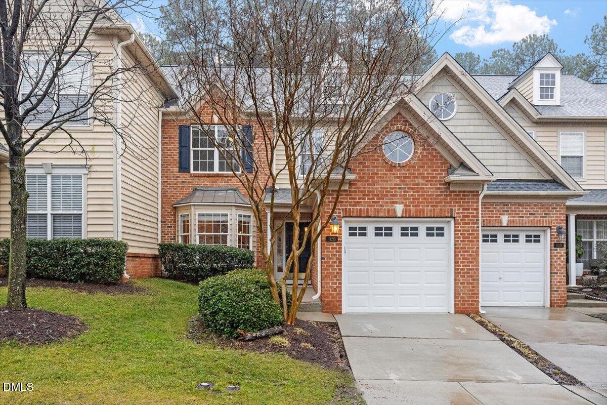 11213 Maplecroft Court Raleigh, NC 27617 - Photo 31 of 44 a front view of a house with a yard
