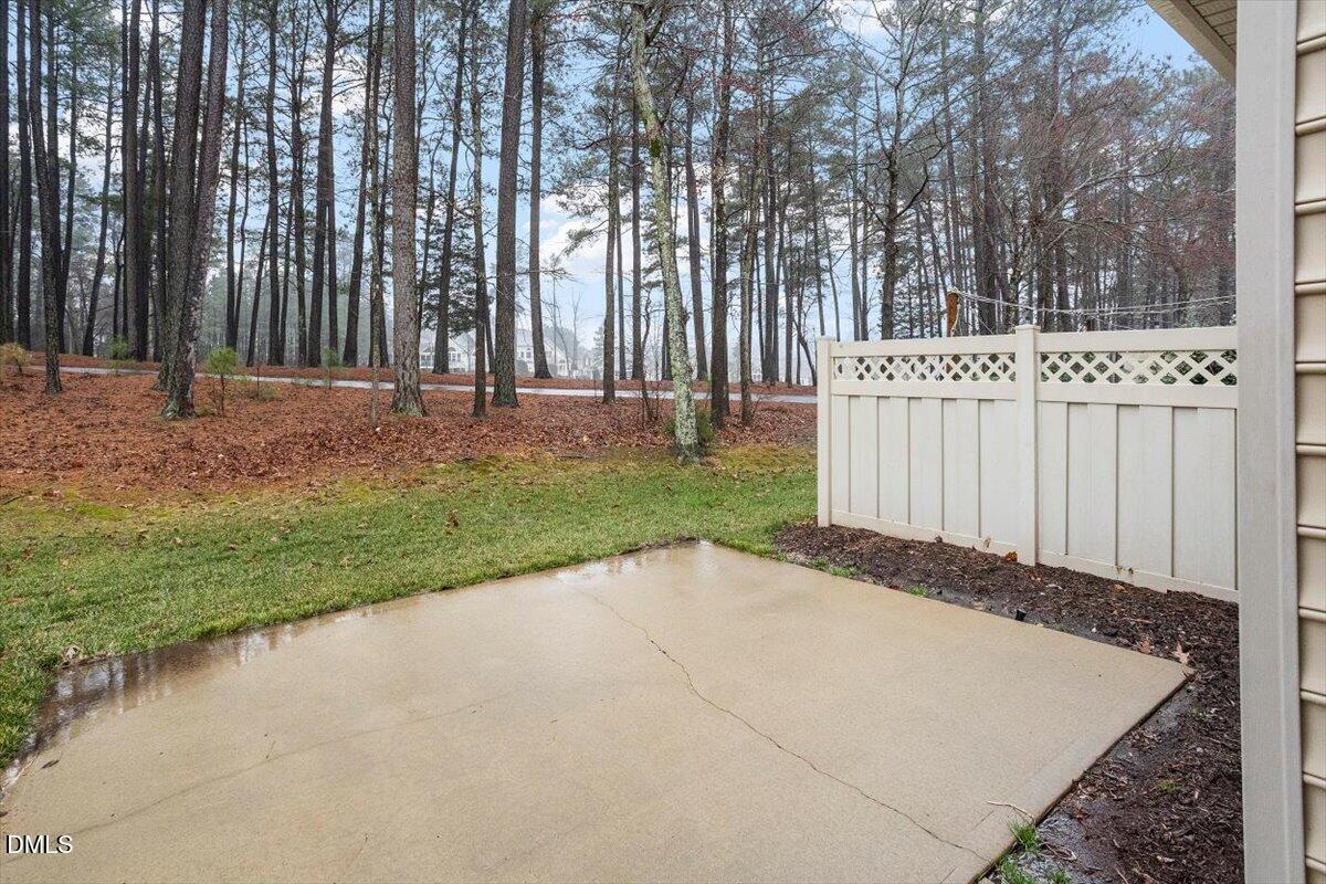 11213 Maplecroft Court Raleigh, NC 27617 - Photo 32 of 44 a view of a backyard with fence