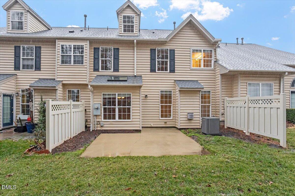 11213 Maplecroft Court Raleigh, NC 27617 - Photo 33 of 44 a front view of a house with a yard and garage