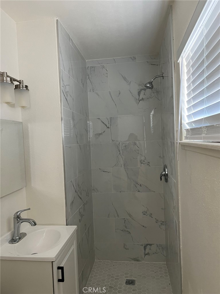 37920 Grandview Avenue Yermo, CA 92398 - Photo 10 of 11 a bathroom with a sink a toilet and shower