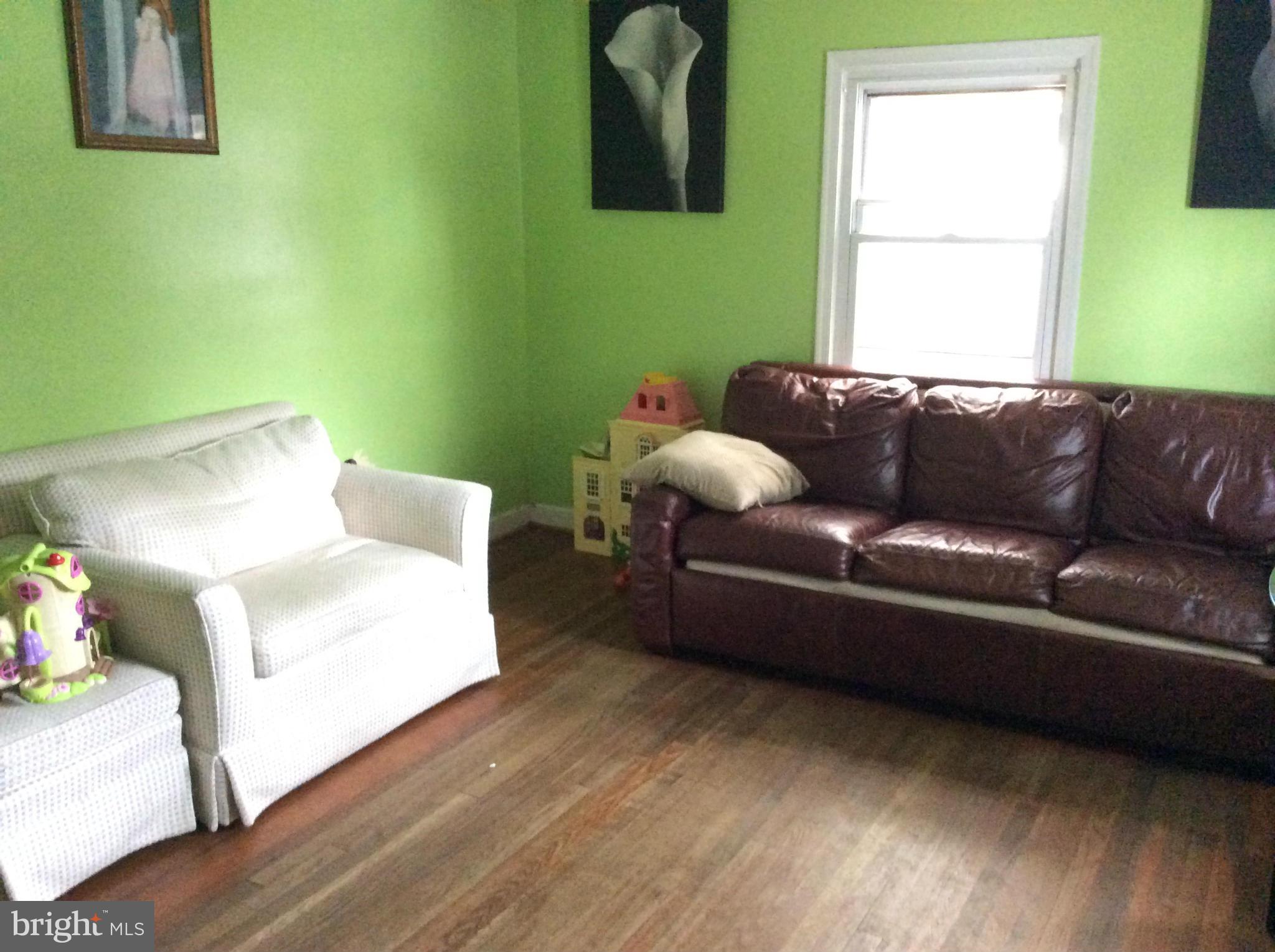 12136 Veirs Mill Road Silver Spring, MD 20906 - Photo 6 of 7 Living Room